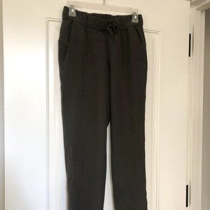 Olive Green Lululemon On the Fly Pant 27", Size 4